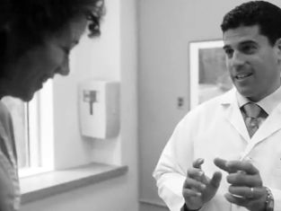 Dr. Lerman speaking with female patient