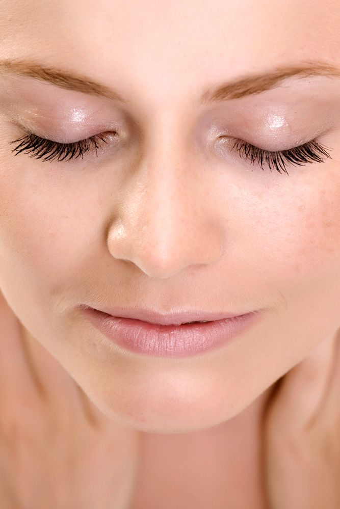 Image of attractive woman's closed eyes